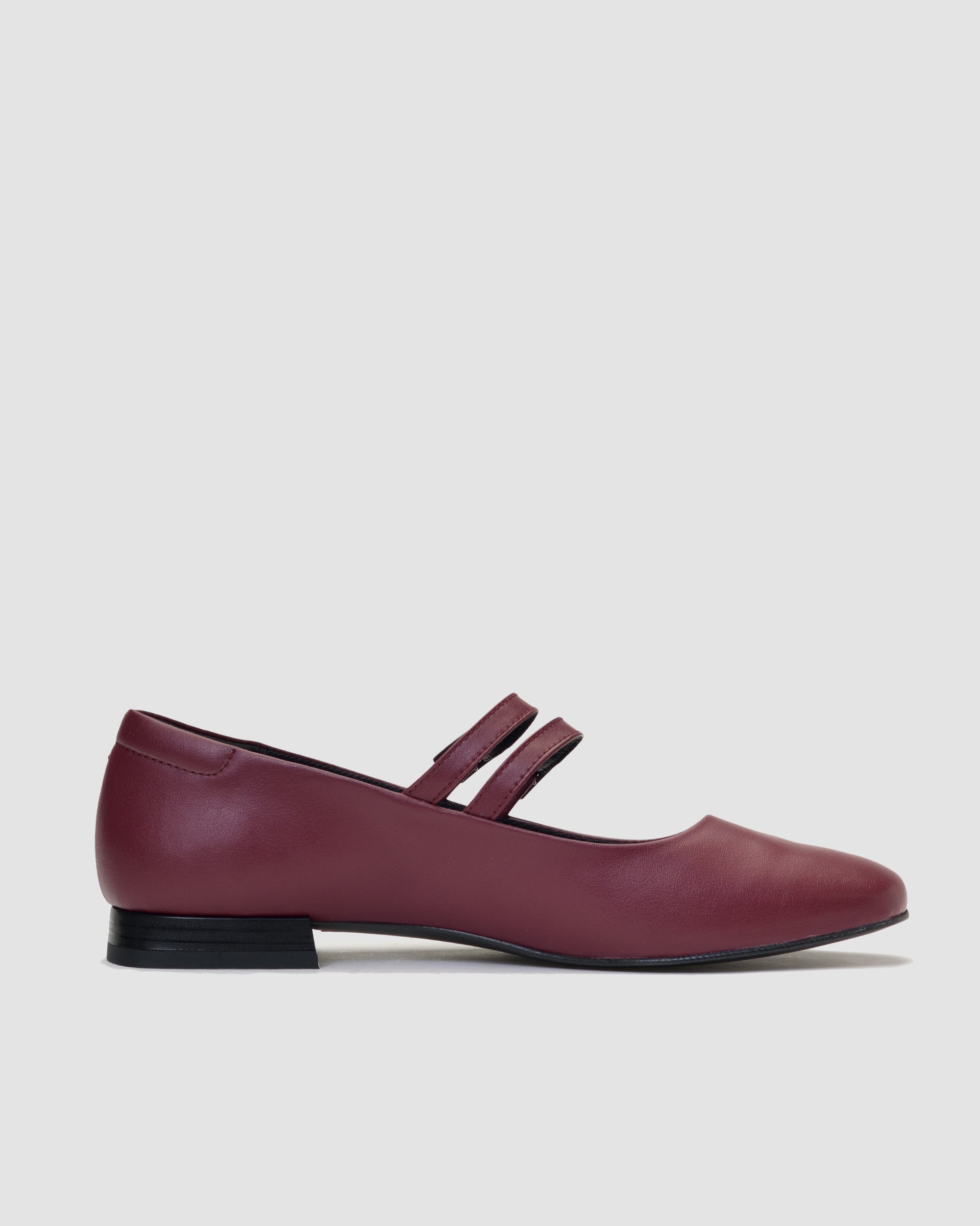 BOHEMA Cherry Mary Jane Pumps in burgundy - worn on foot of women's Mary Jane ballet flats